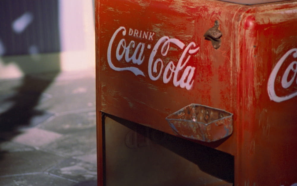 coca cola refrigerator with ice cold beer