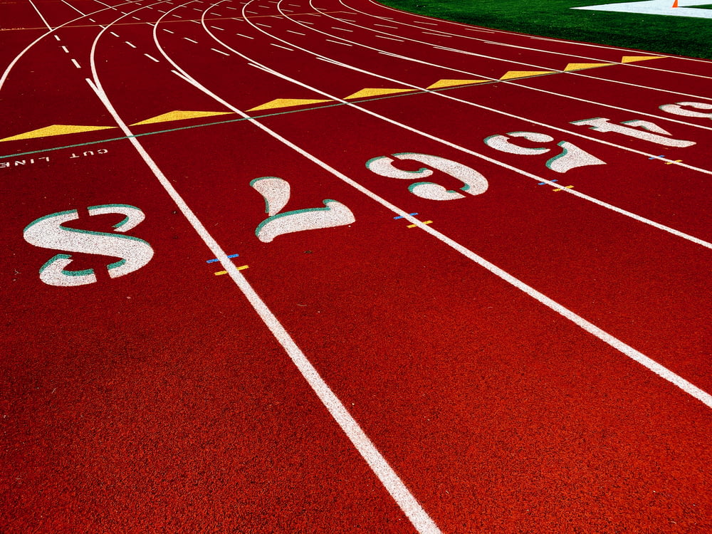 red and white track field