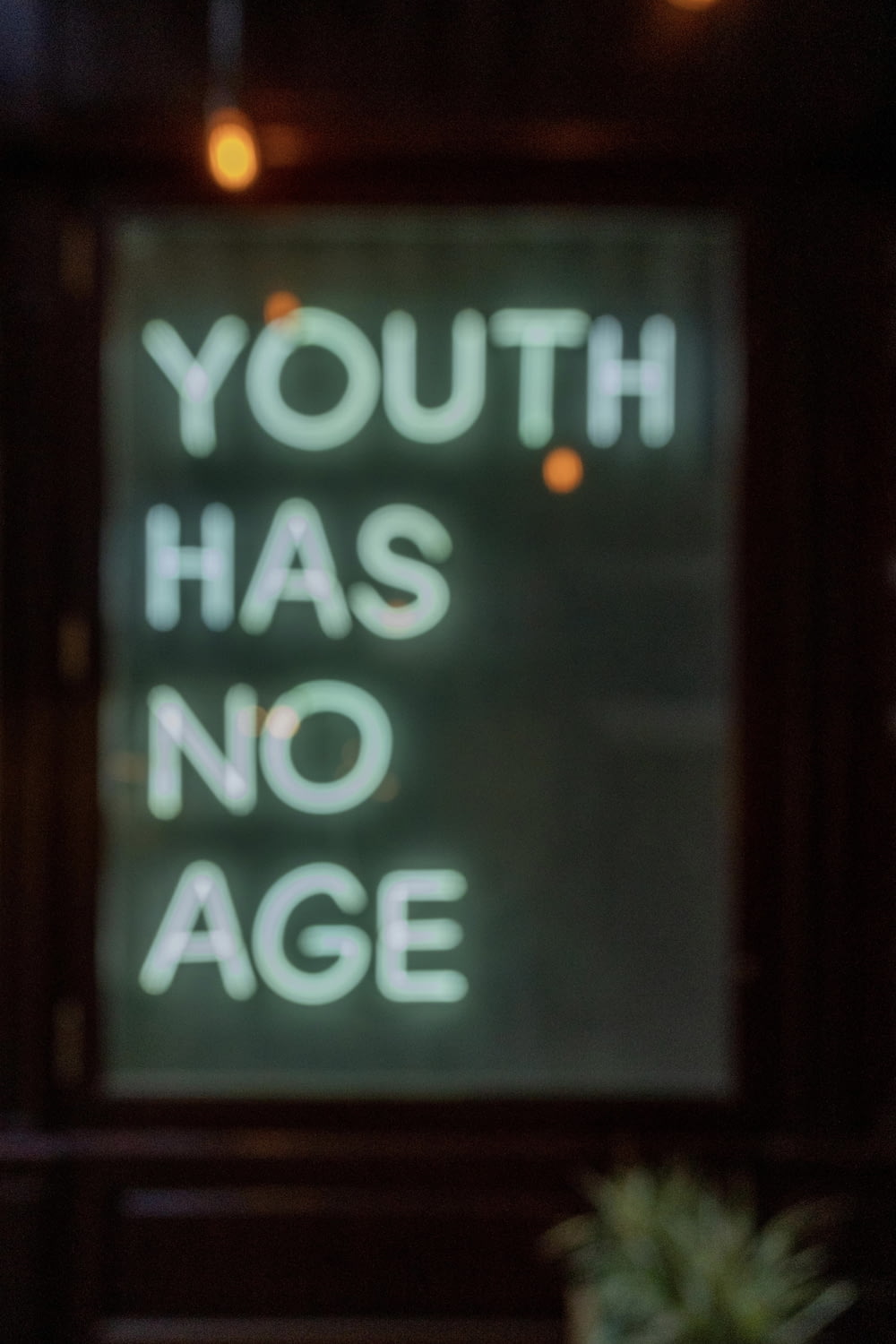 a sign that says youth has no age