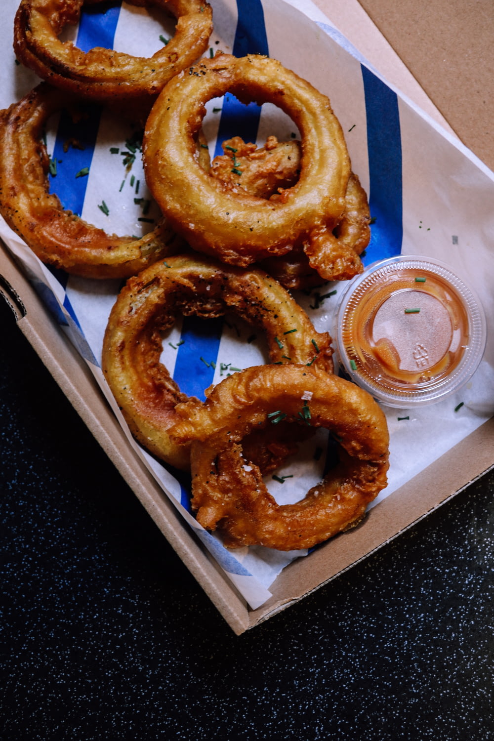 onion rings on white paper