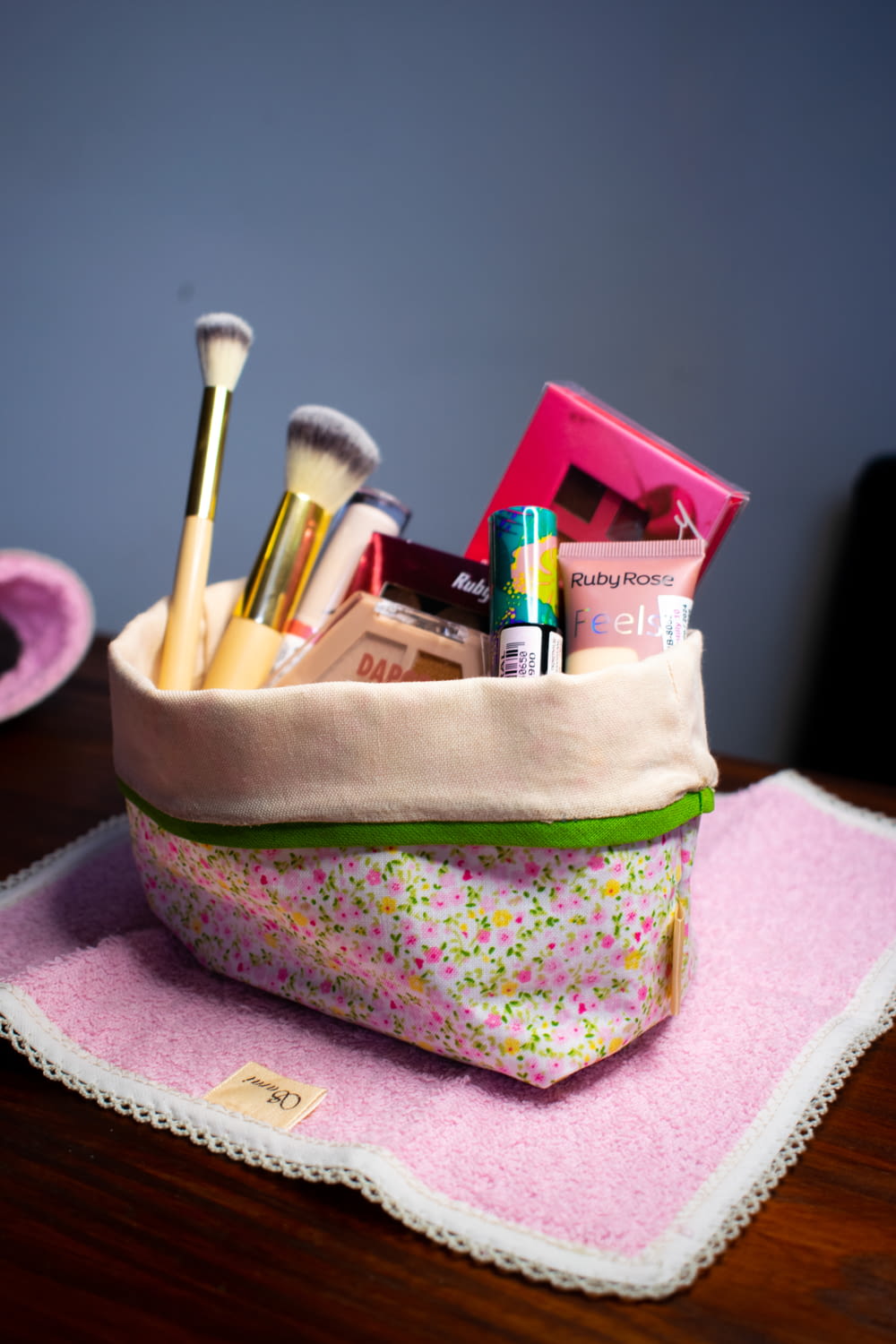 a purse with makeup and other items in it