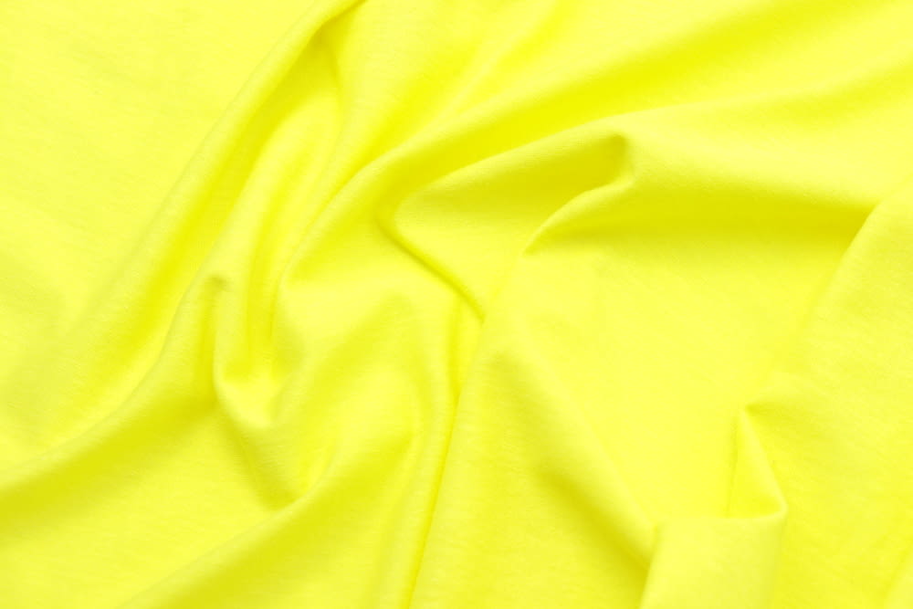 a close up of a yellow fabric