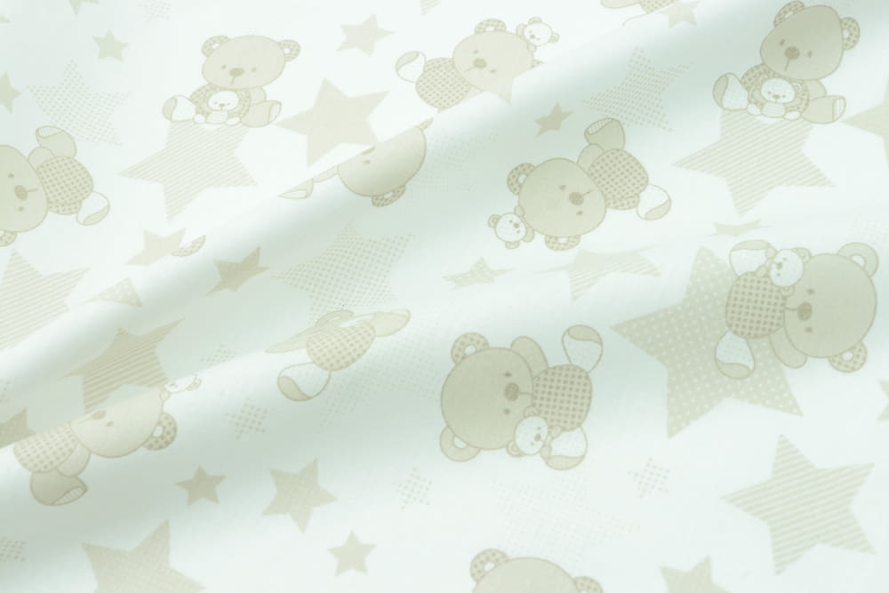 a teddy bear pattern on a white background
