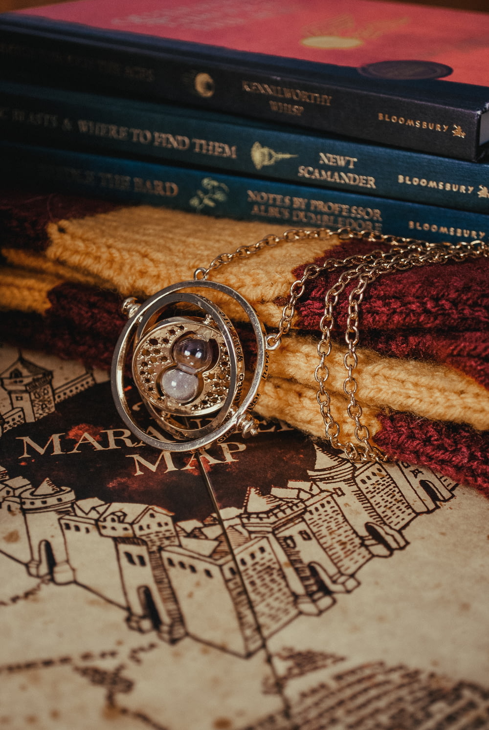 a close up of a necklace on a book