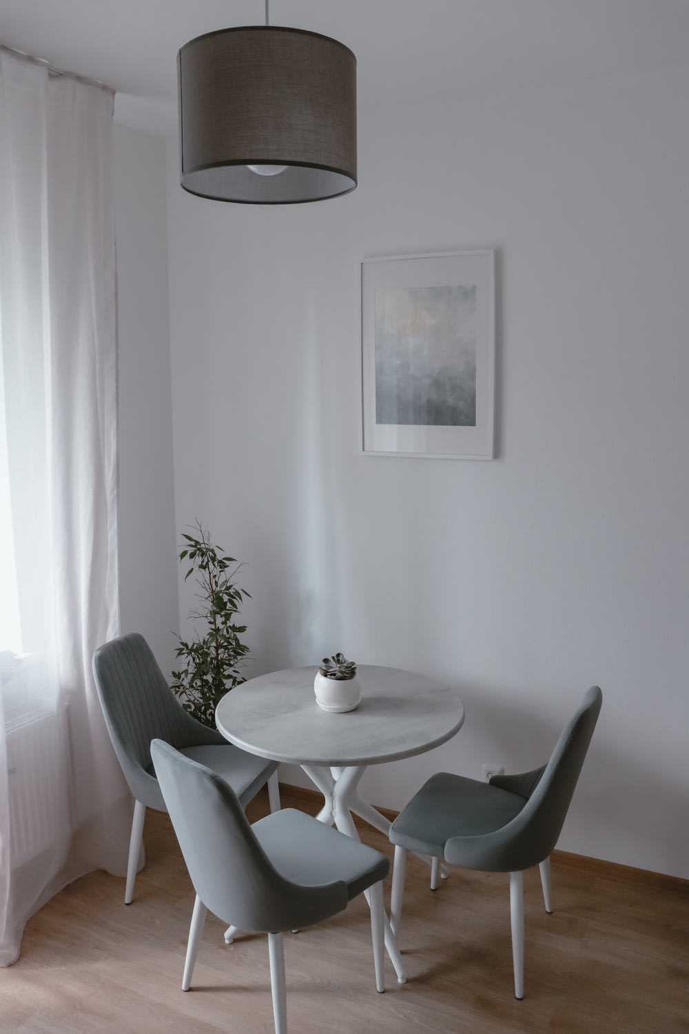 a white table and chairs in a room