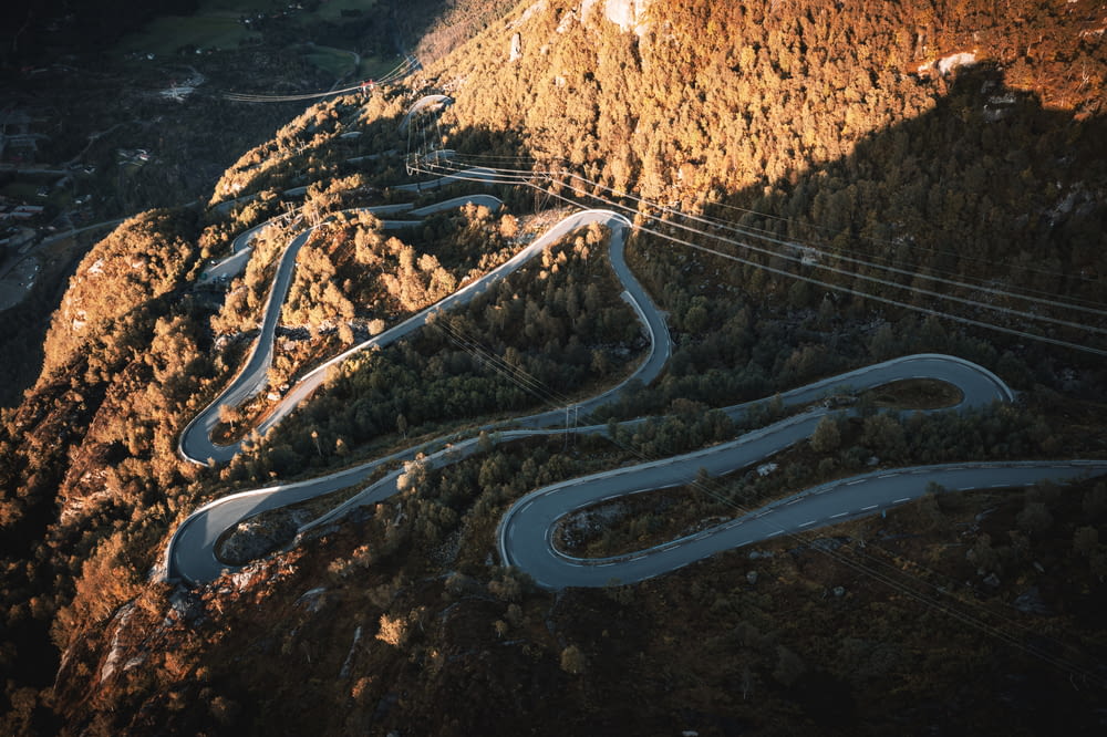 an aerial view of a winding mountain road