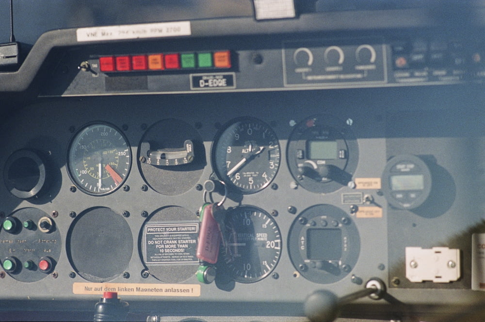 a close up of a control panel on a plane