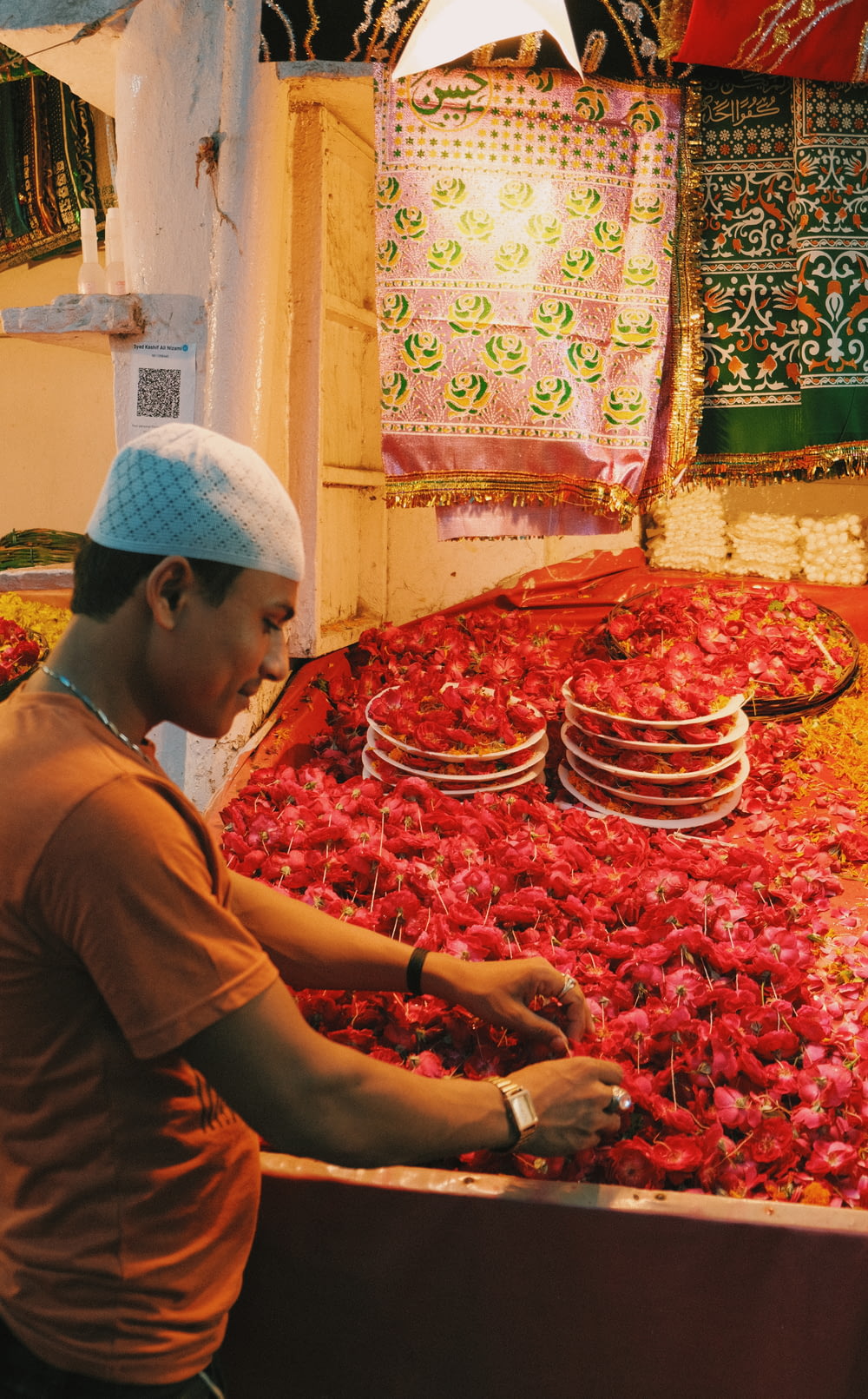 a man working in a flower shop