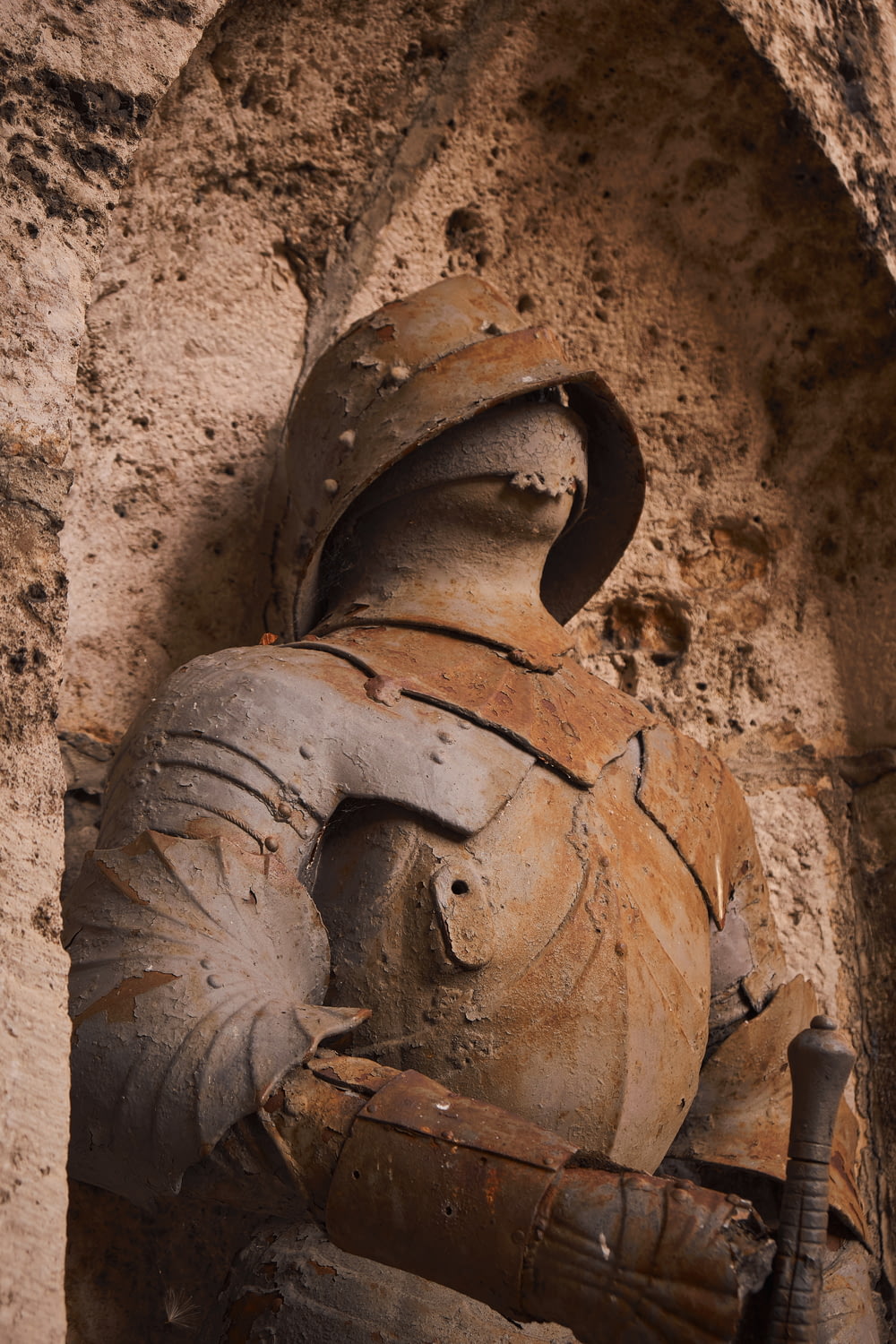 a close up of a statue of a knight