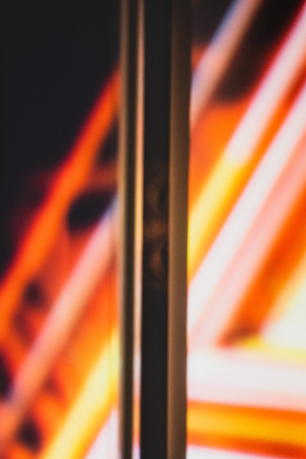 a close up of a pair of skis with a blurry background