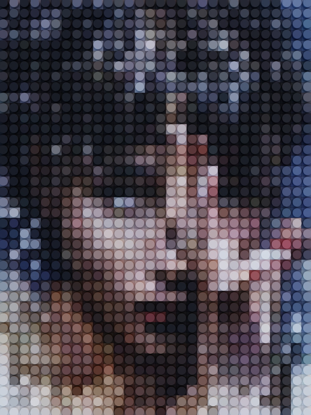 a close up of a person's face with a blurry background