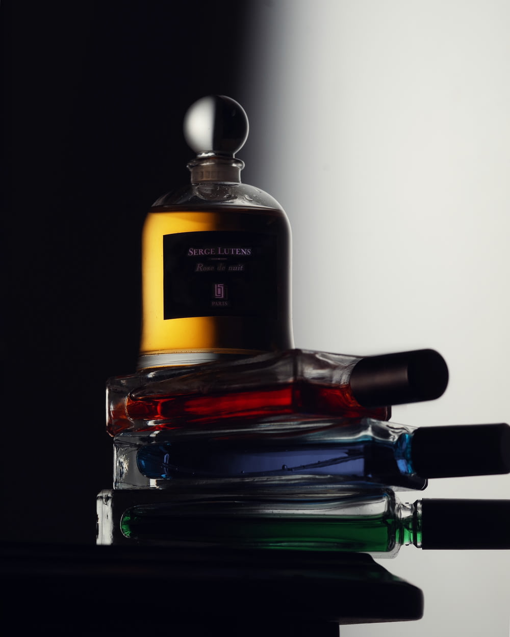a bottle of perfume sitting on top of a table