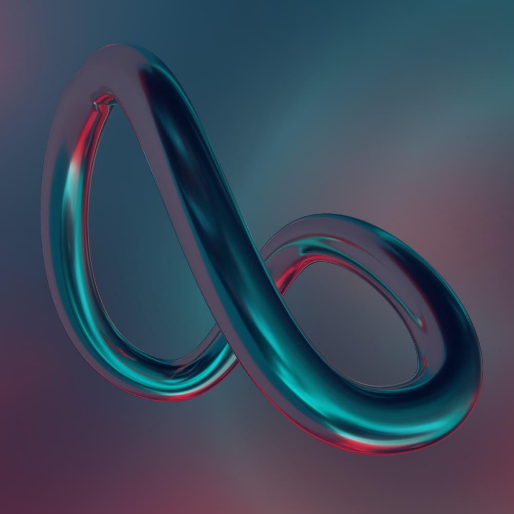 ein blau-rotes Objekt mit einem langen gebogenen Schwanz