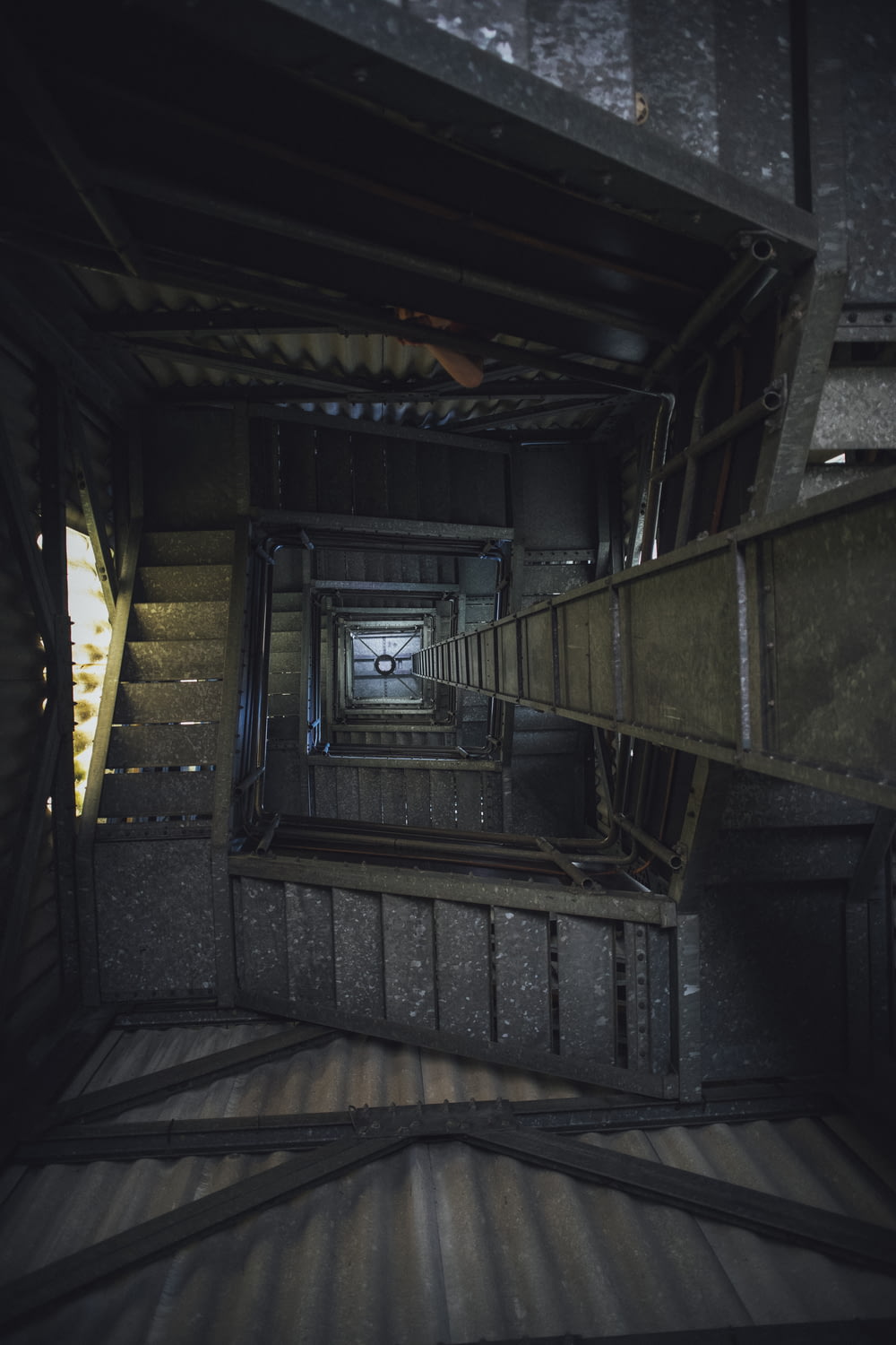 a very dark looking room with some stairs