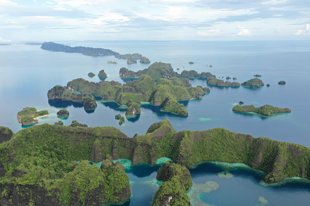 an aerial view of a group of islands in the ocean