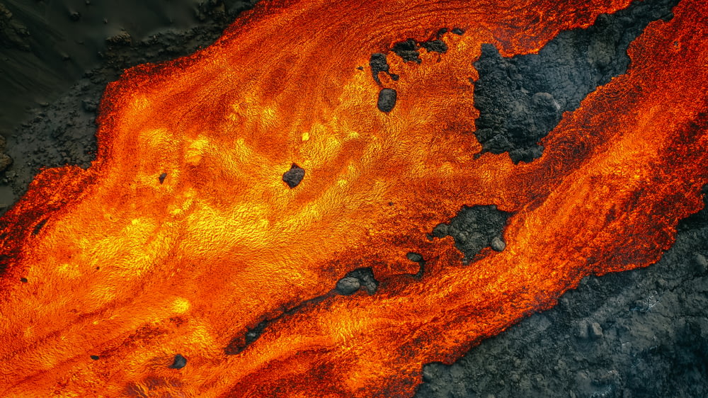 a close up of an orange and black substance