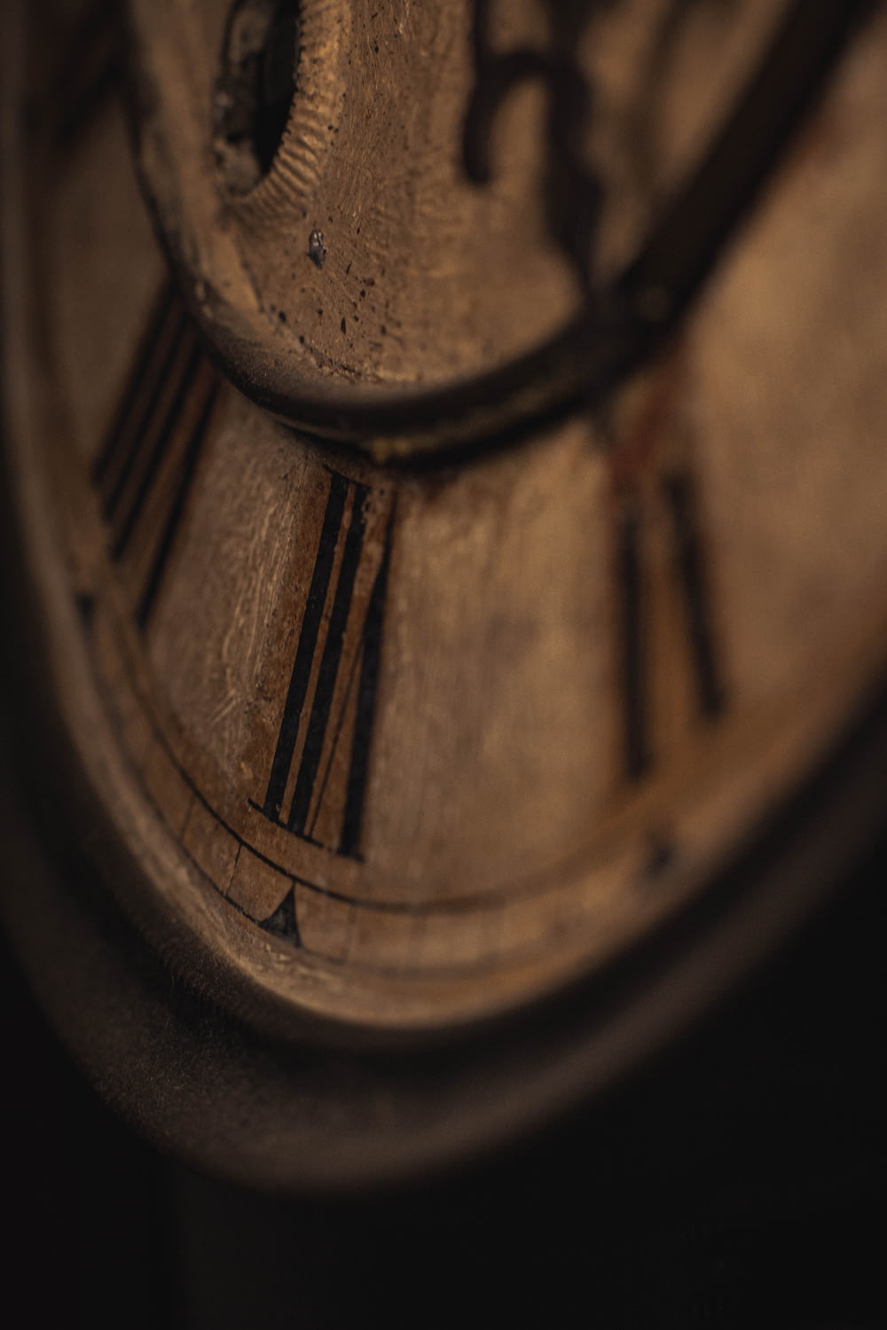 a close up of a clock with roman numerals