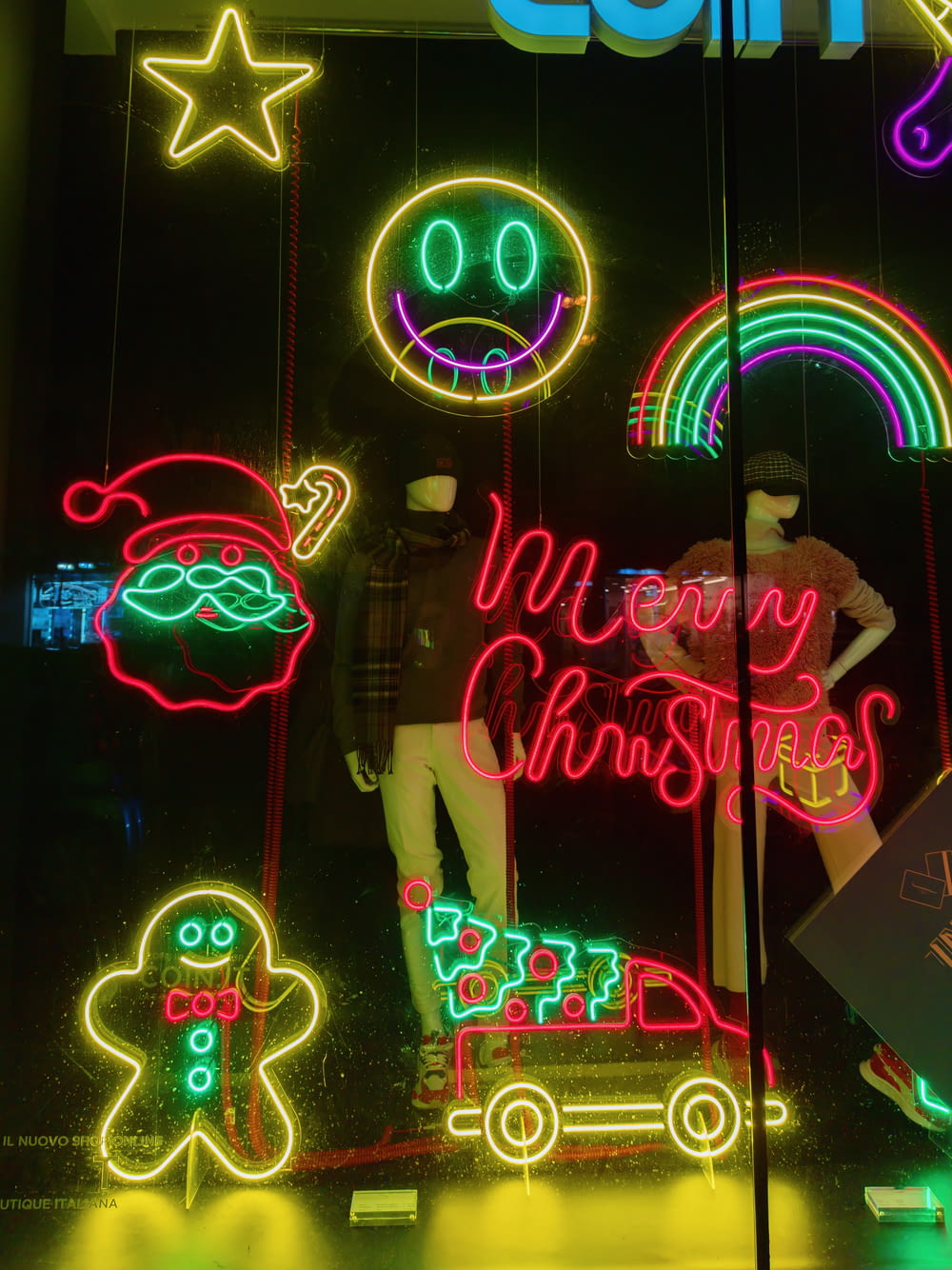 a window display of christmas lights and decorations