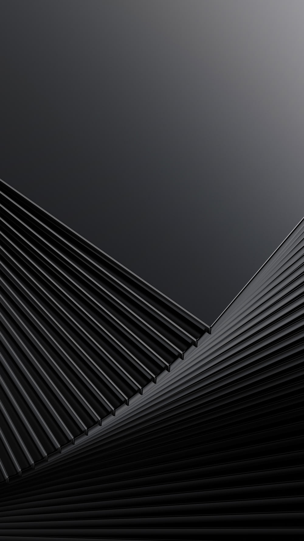 a close up of a black surface with lines