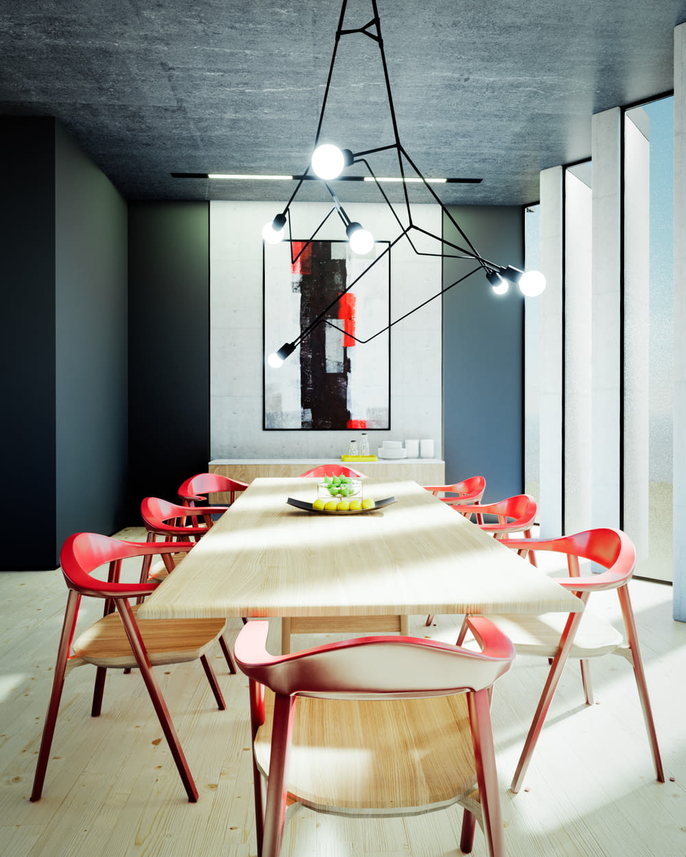 a dining room with a long table and red chairs