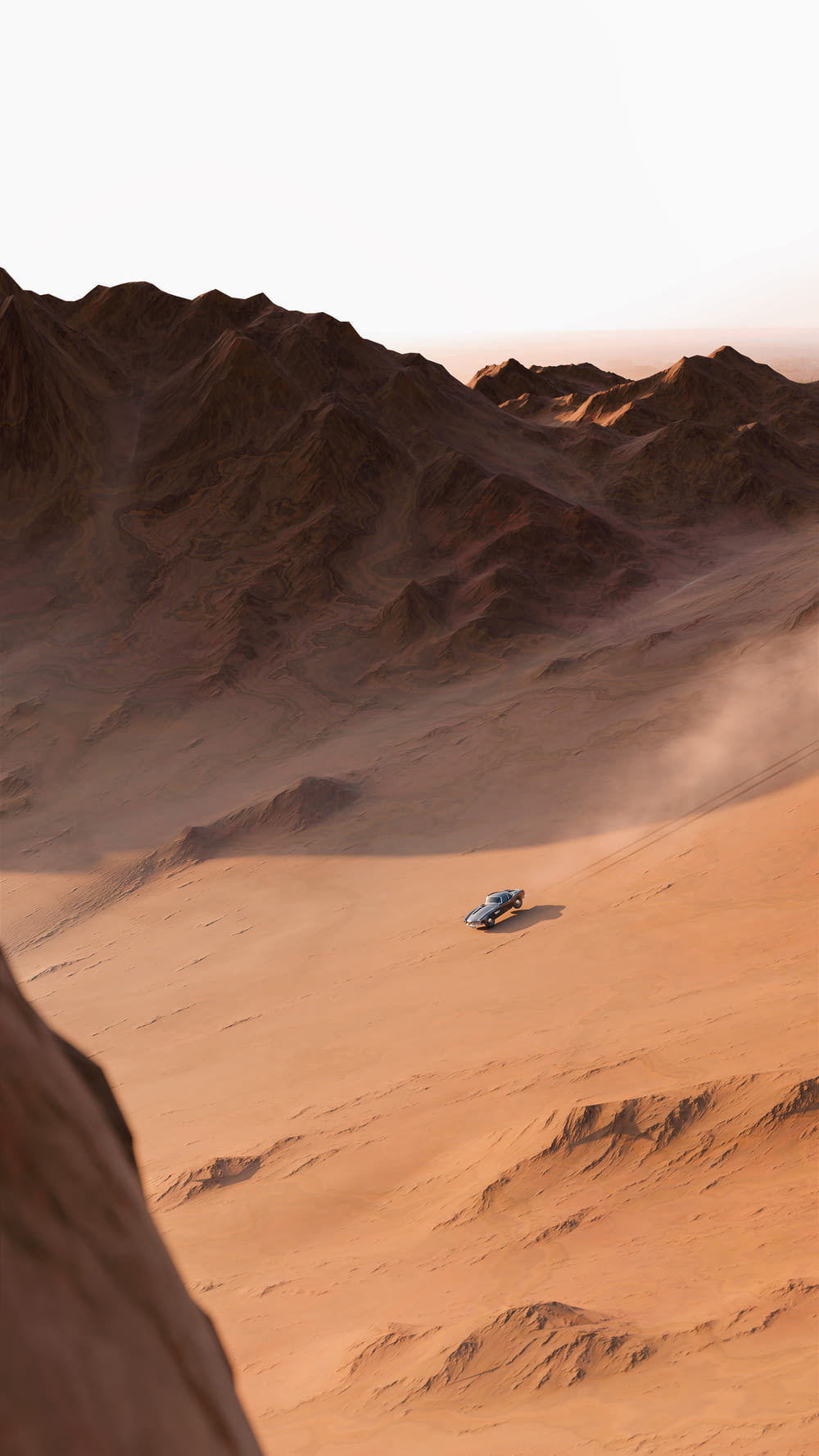 a car is driving through the desert