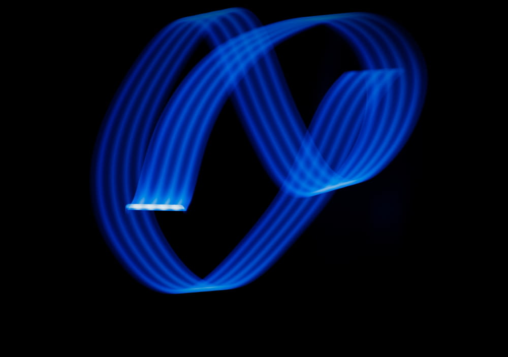 a blurry photo of a blue object in the dark