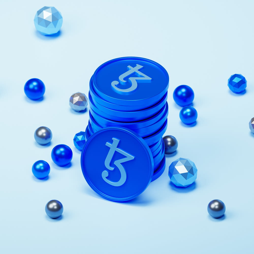 a stack of blue tokens sitting on top of a table