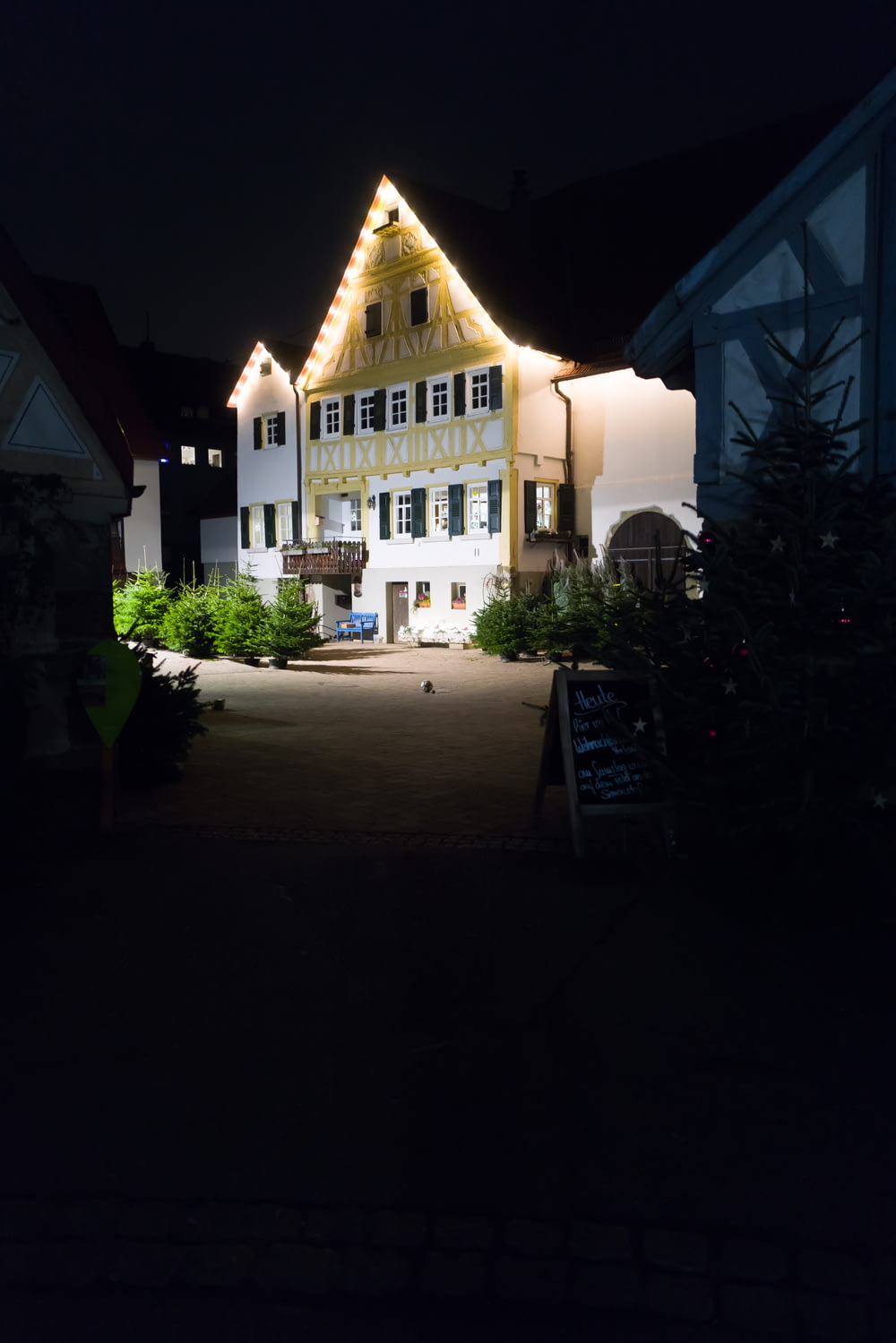 a large house with a lot of lights on it