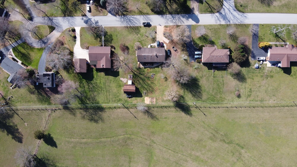 an aerial view of a neighborhood in a rural area