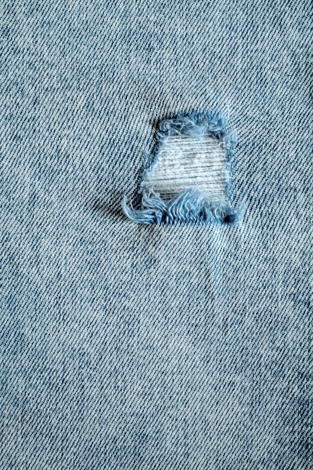 a hole in the back of a pair of jeans