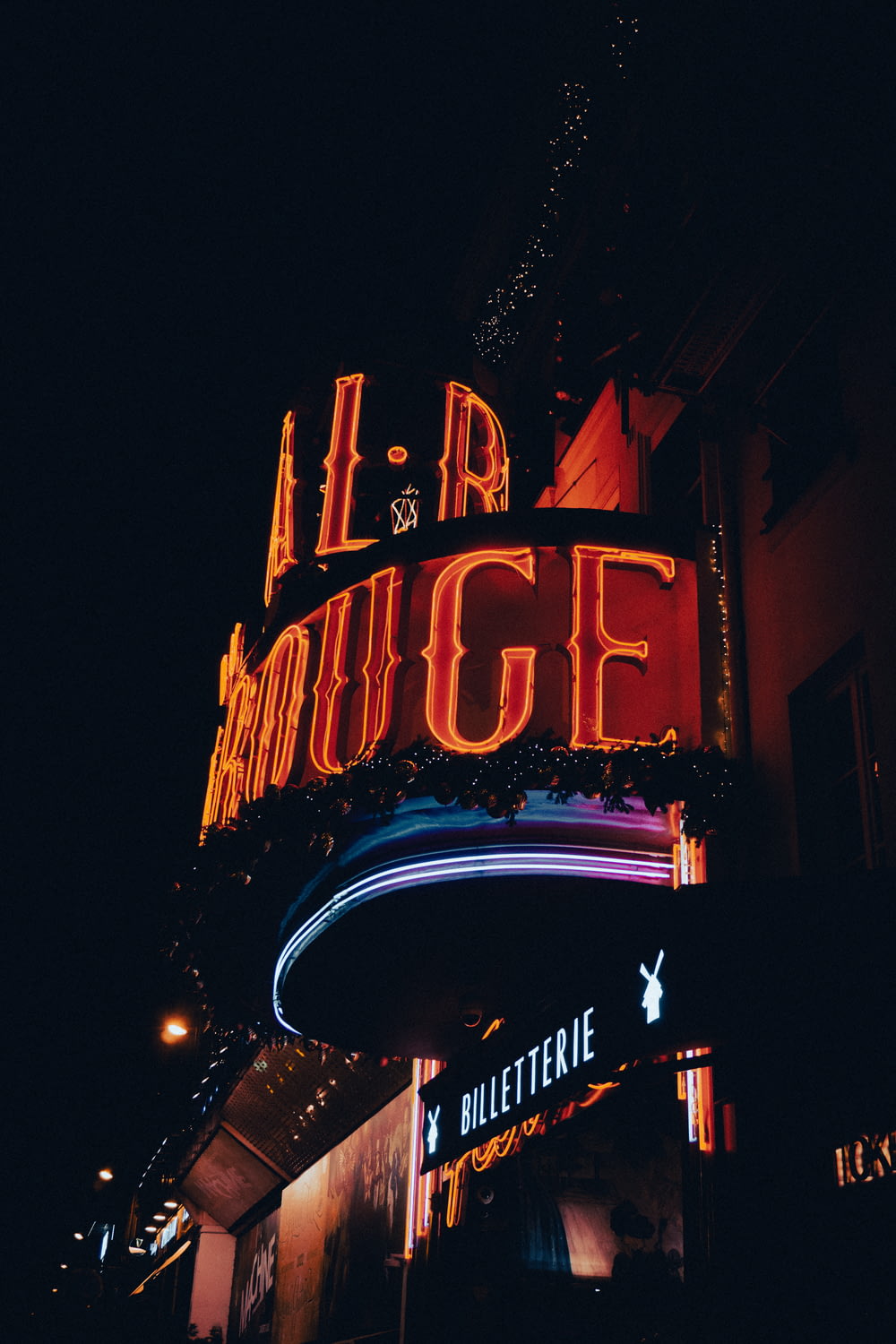 a neon sign that reads air and dodge
