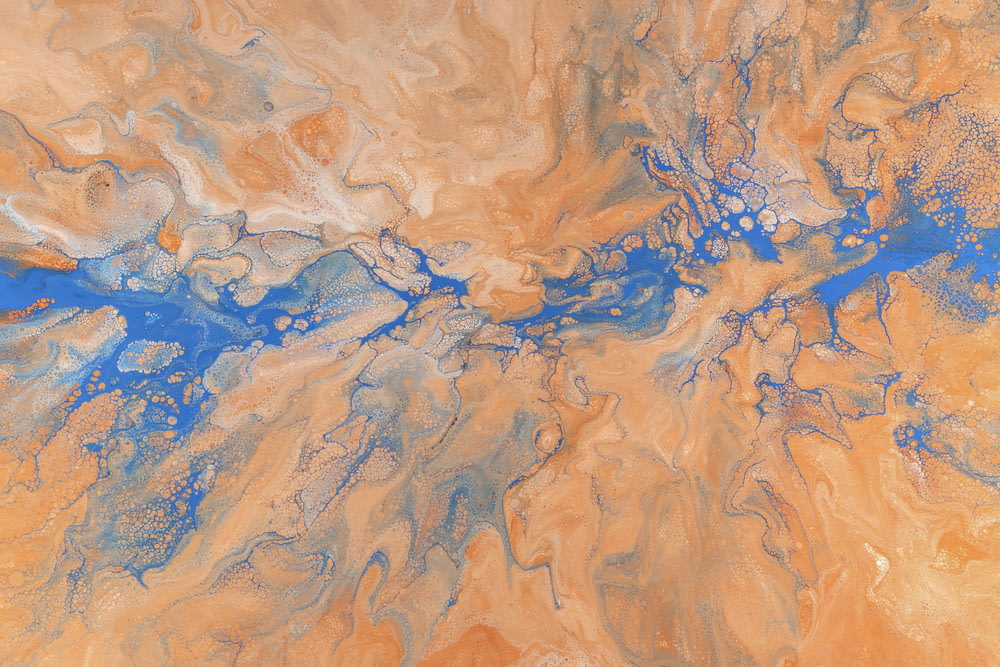 a painting with blue and orange colors on it
