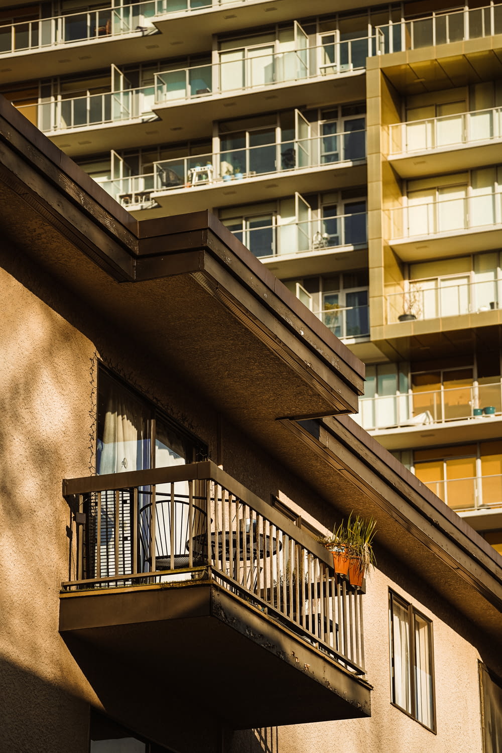 an apartment building with balconies and a balcony