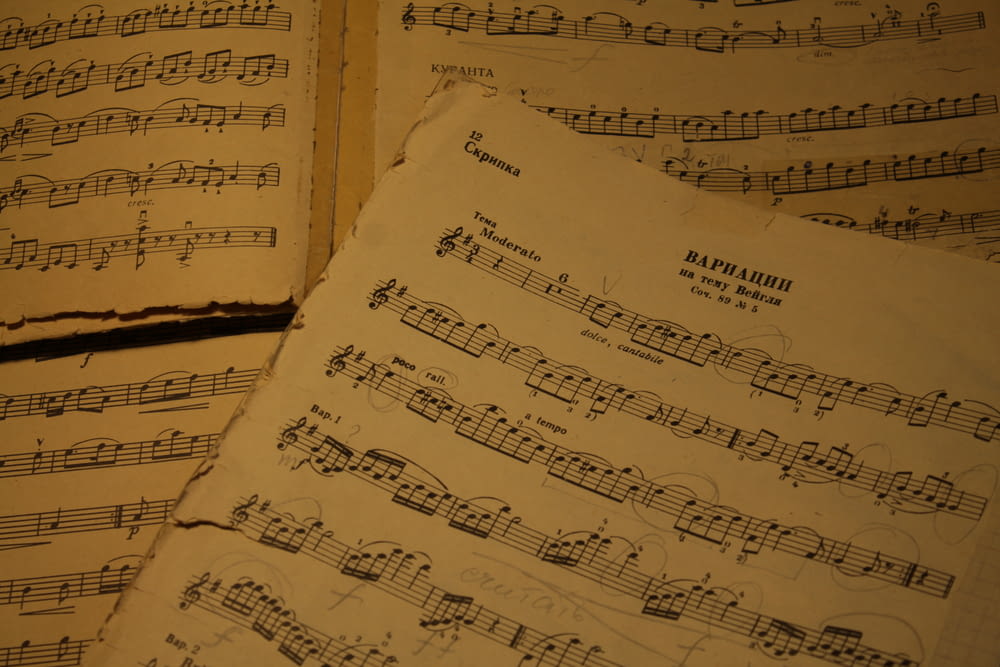 a close up of sheet music on a table
