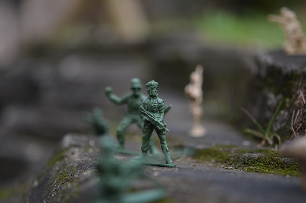 a group of toy soldiers standing next to each other