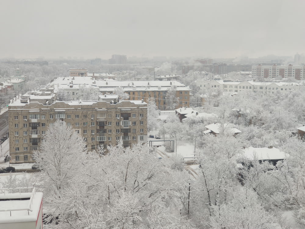 a view of a city covered in snow