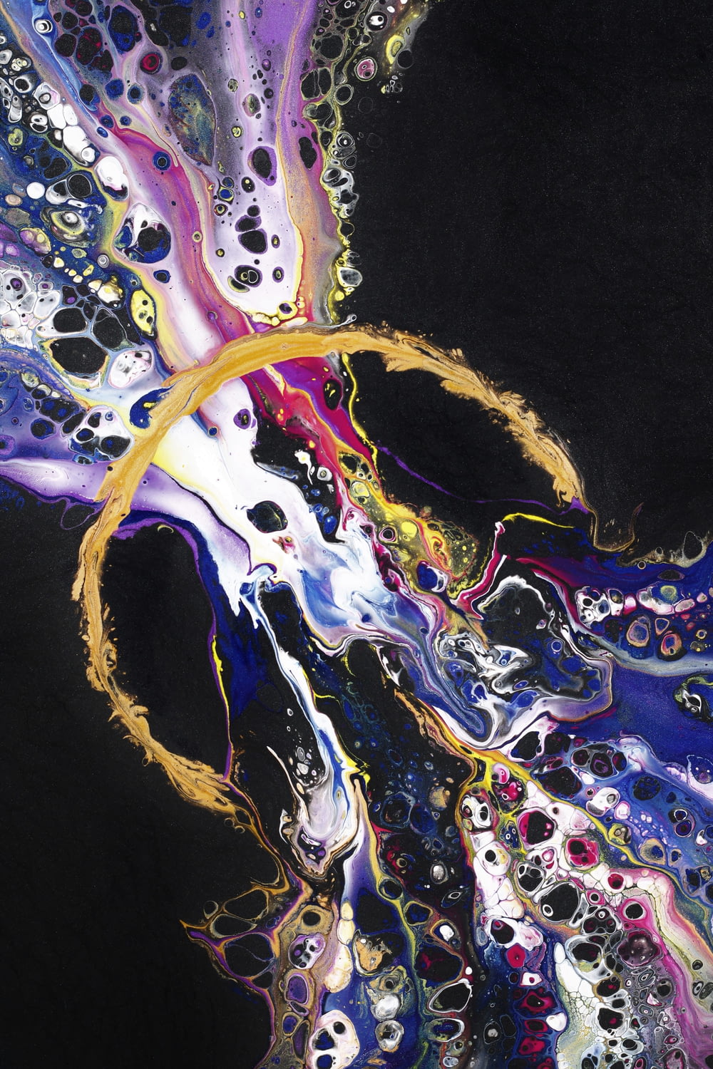 a painting of a black, yellow, and purple swirl