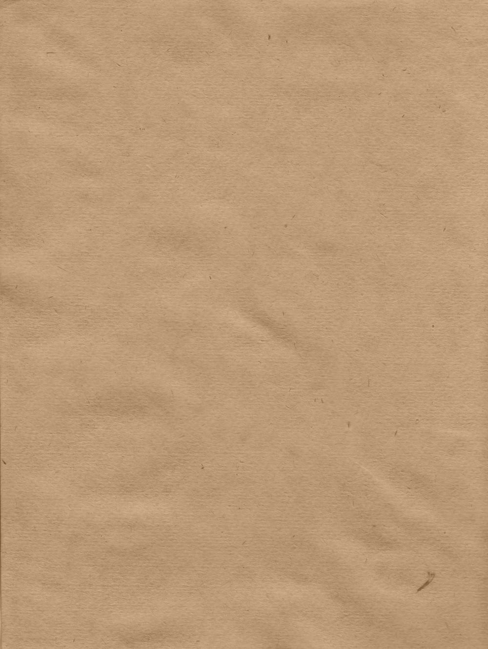 a piece of brown paper with a white background