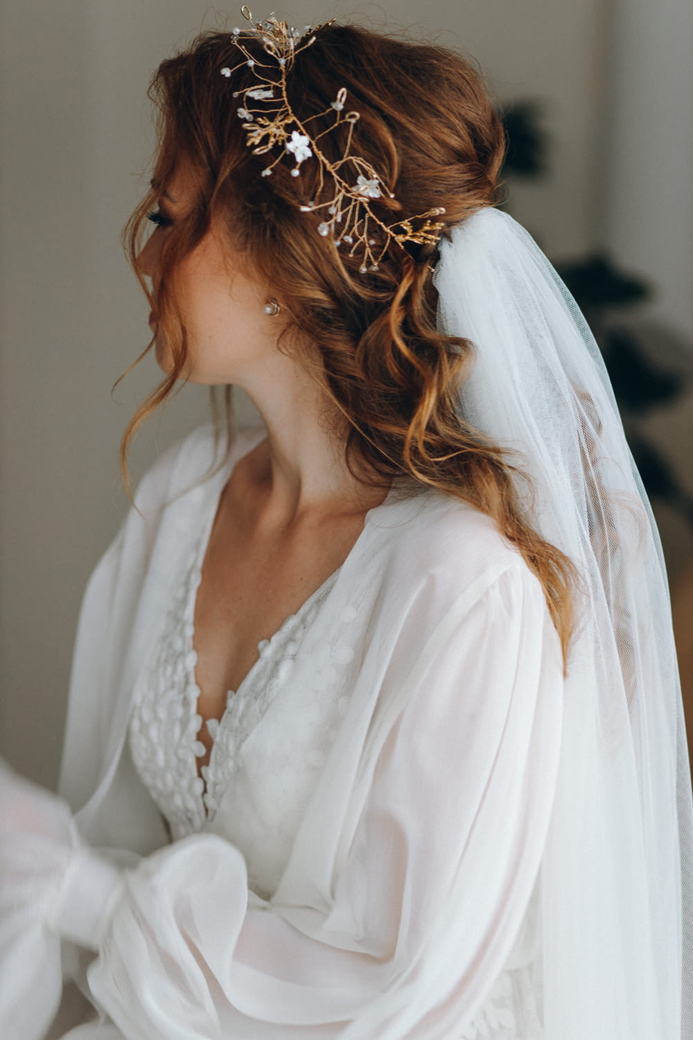 a woman wearing a veil and a tiara