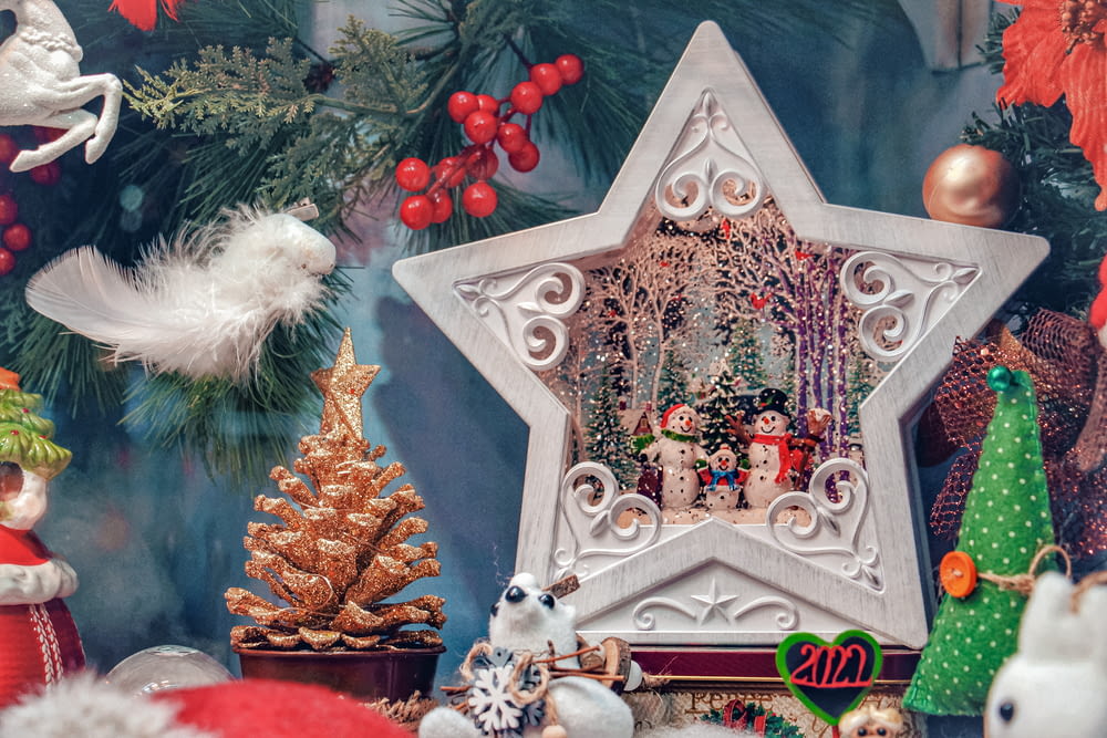 a christmas scene with a star and other decorations