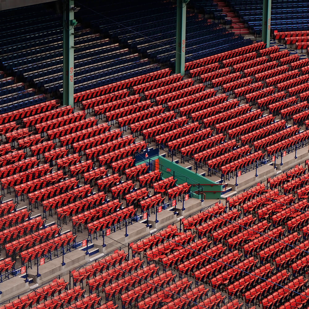 a stadium filled with lots of red seats