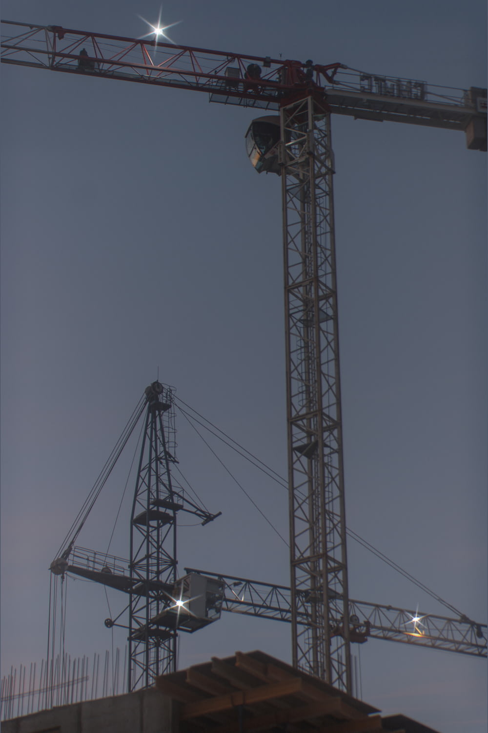 a large crane sitting on top of a building