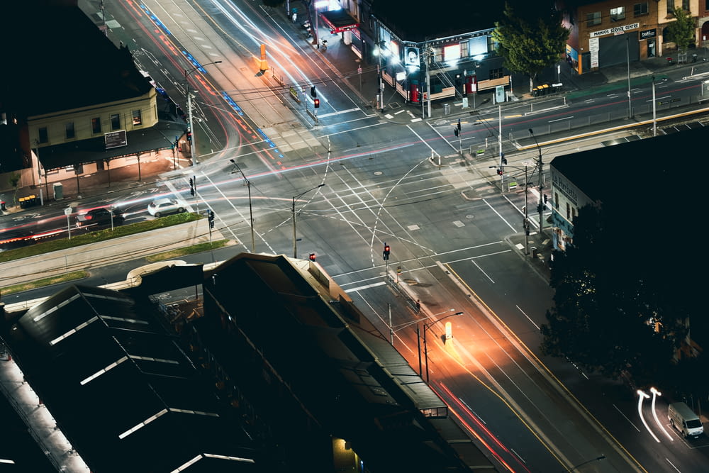 an aerial view of a city street at night