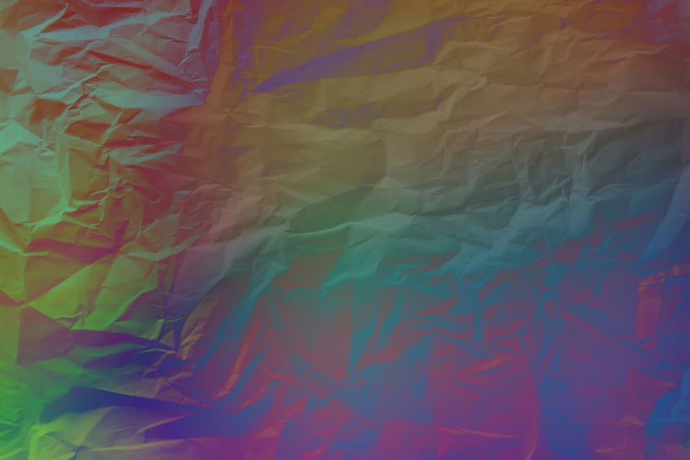 a multicolored background of crumpled paper