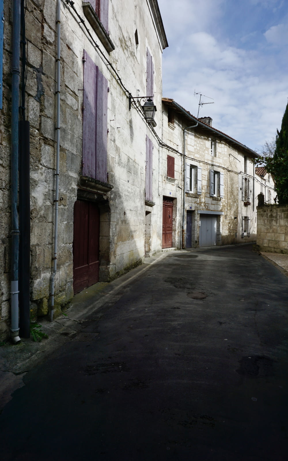 an empty street in an old european town