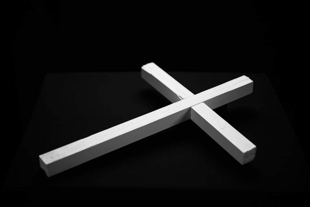 a white cross on a black background