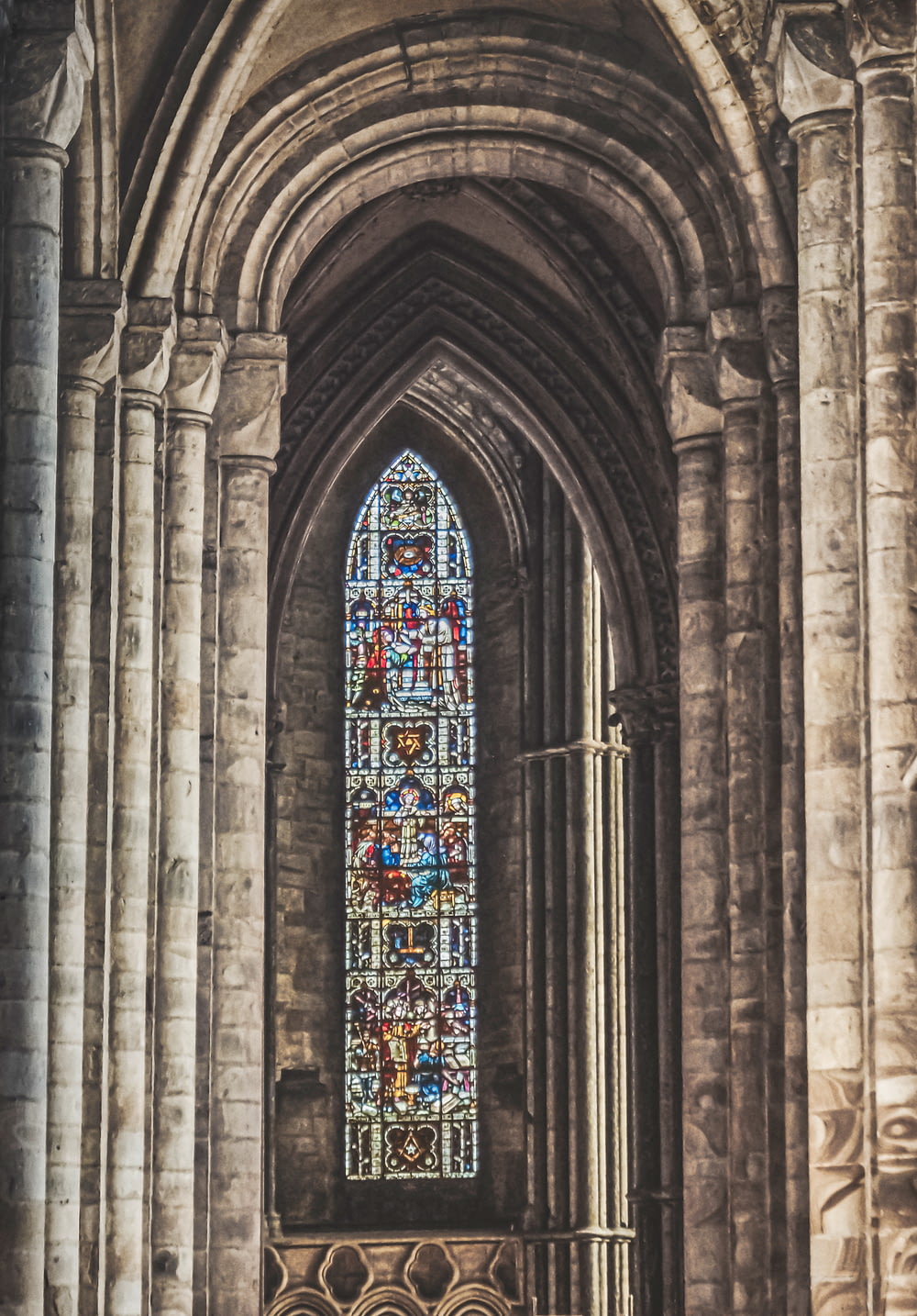 a cathedral with a large stained glass window