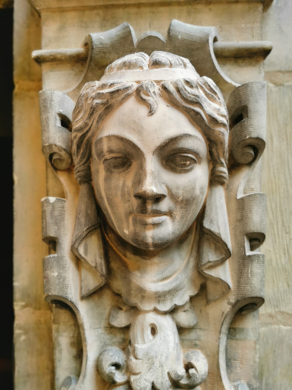 a close up of a statue of a woman