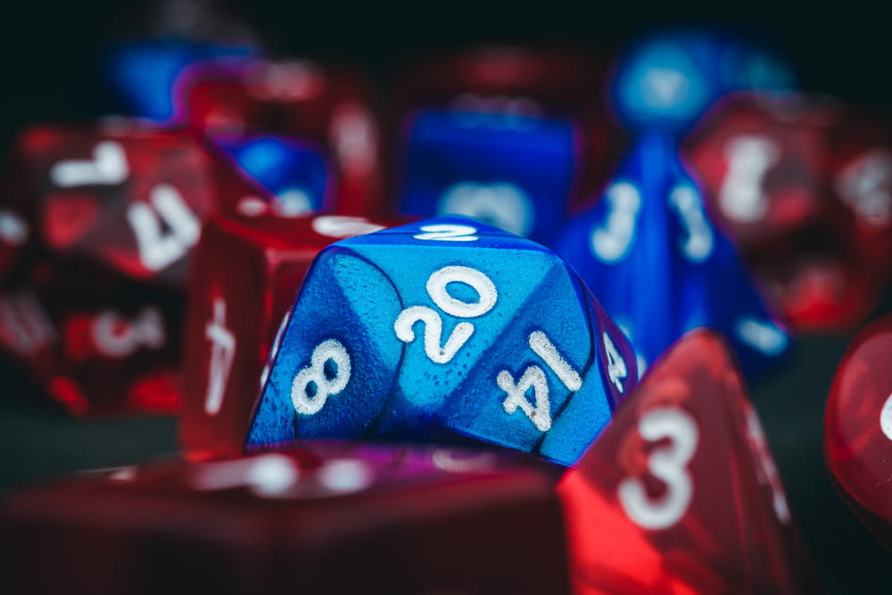 a close up of a blue and red dice
