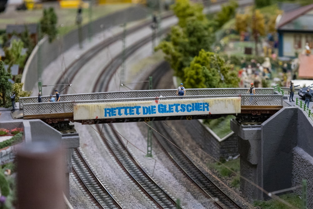 a model train track with a bridge over it